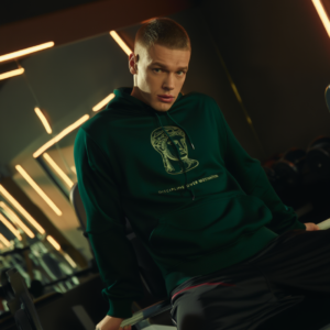 Home discipline over motivation" stoic greek statue premium hoodie | forest green oversized pullover | gym & streetwear motivational hoodie for men